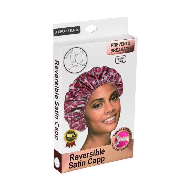 A box of a leopard print and black reversible satin hair cap is shown.